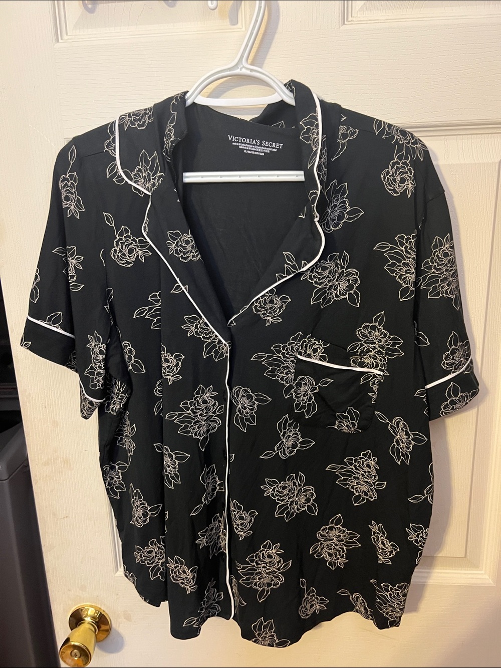 Victoria's Secret Black Floral Satin Button-Front Pajama Top with White Trim.